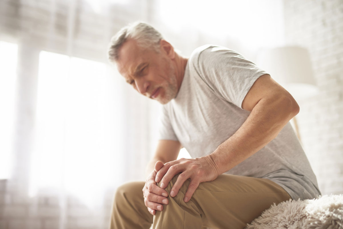 retired man pensioner suffering knee pain home pain management pain management,pain clinic,back pain specialist near me,pain management doctors near me